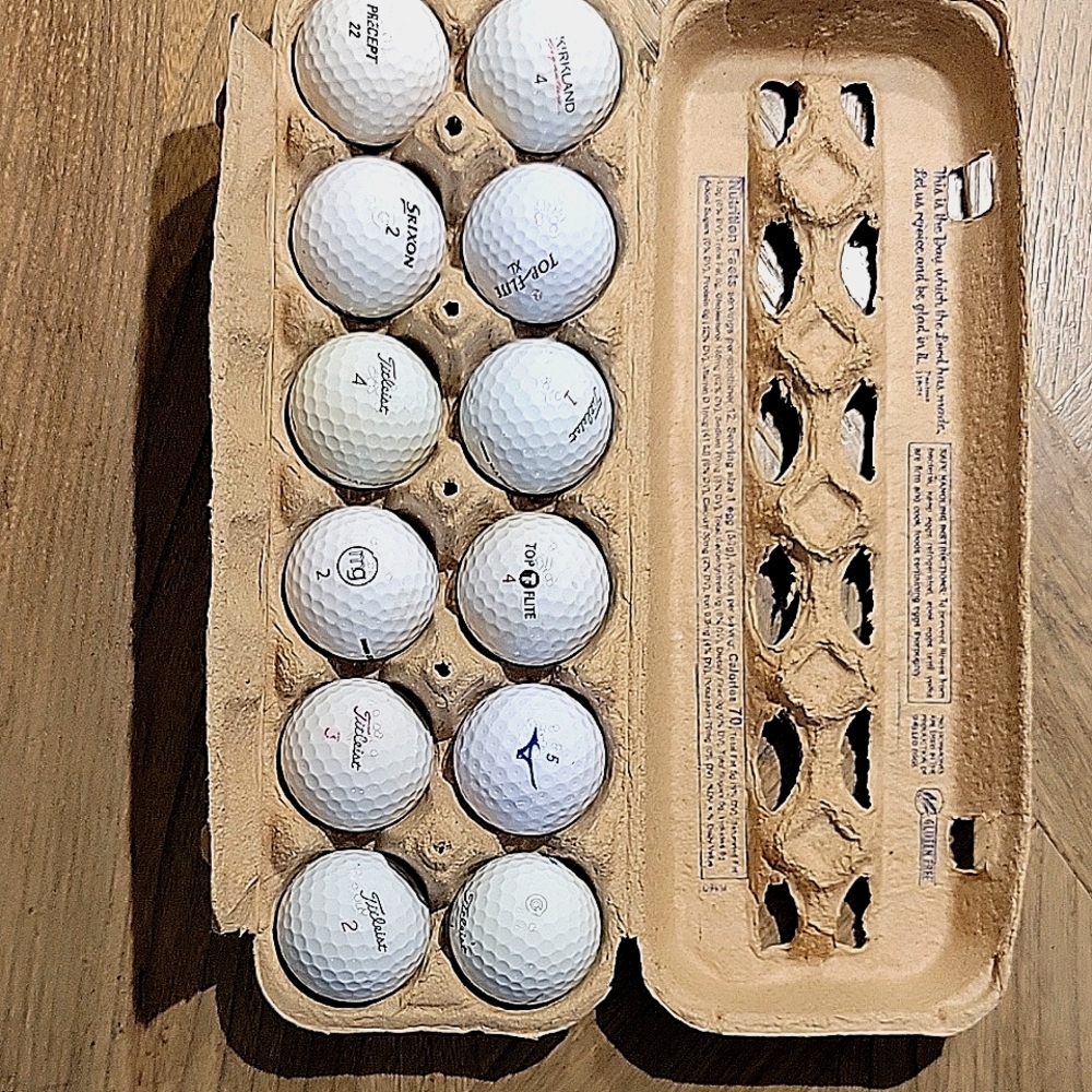 Assorted White Golf Balls in Carton